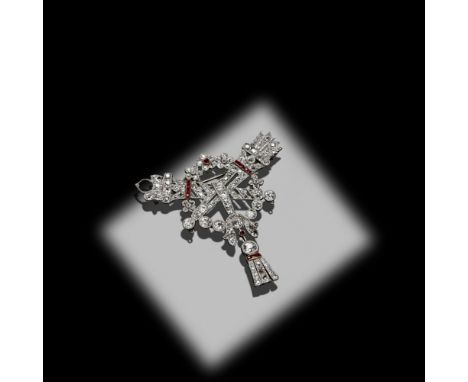 An early 20th century diamond set brooch  modelled as a crossed hymeneal torch and quiver of arrows in stylised garland with 