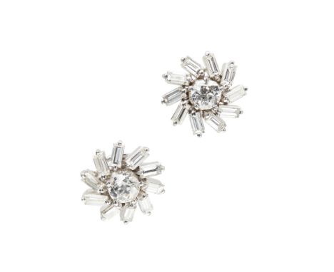 A pair of diamond cluster earrings  each claw set with a single round old round cut diamond, in a radiating surround claw set