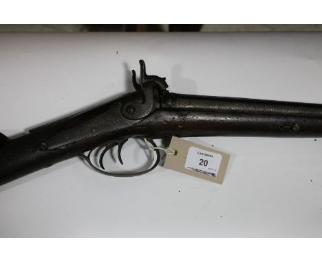 A PERCUSSION SPORTING GUN & FLASK. A double-barrelled percussion sporting gun with worm damaged stock. In need of repair/reno