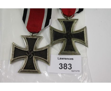 TWO IRON CROSSES. Two 2nd Class Iron Crosses , the first marked 65 on the ring and the second 4 again on the ring.