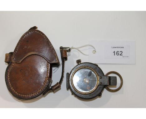 A MILITARY COMPASS. A brown leather cased military compass marked F Darton & Co London No 6152 1913. With no initials or WD s