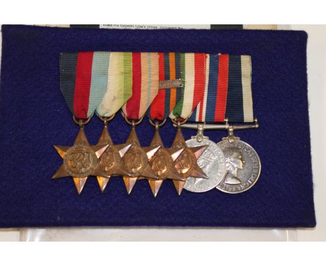 A RIVER PLATE HMS EXETER LSGC GROUP OF SEVEN MEDALS. Awarded to Engine Room Artificer 1V  Francis Curnow MX 59983 , later C E