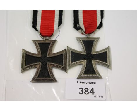 TWO IRON CROSSES. Two 2nd Class Iron Crosses, one of which is marked 23 on the ring. (2)