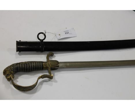 A GERMAN OFFICERS SWORD. An Imperial German period Cavalry officers sword, complete with it's steel scabbard. Cast brass hilt