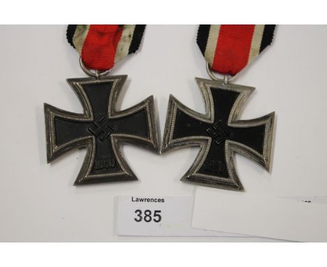 TWO IRON CROSSES. Two 2nd Class Iron Crosses, marked 30 & 55 on their respective ring suspenders.