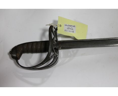 AN OFFICERS SWORD. A Victorian Rifle Officers sword, with steel hilt and slung bugle. Pipeback 32.1/4" blade with spearpoint 