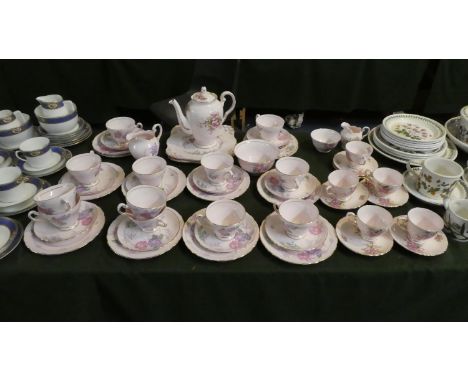 A Collection of Tuscan Pink Floral Tea and Coffee Wares to Include Ten Trios, Five Coffee Cans and Saucers, Coffee Pot, Cake 