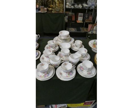 A Collection of Paragon China Teawares to Include Eight Trios, Two Cream Jugs, Two Sugar Bowls, Spare Side Plates and Saucers