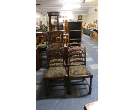 A Set of Four Oak Framed Ladder Back Dining Chairs with Tapestry Back Seats 