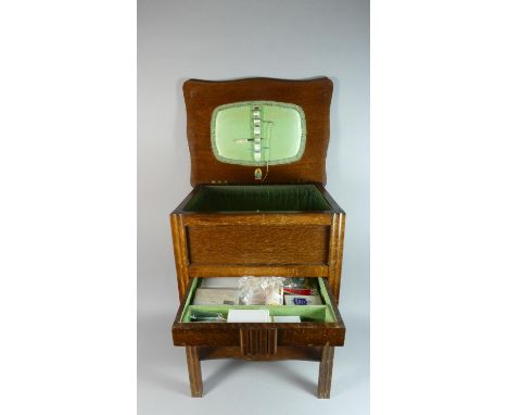 An Edwardian Oak Lift Top Sewing Box on Stand with Gallery Shelf, 45cm Wide 