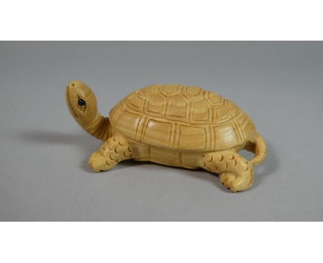 A  Carved Wooden Netsuke in the Form of a Tortoise, 6.5cm Wide 