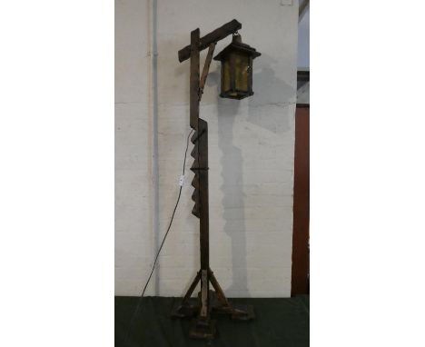 A Mid 20th Century Oak Novelty Standard Lamp with Amber Glass Panels to Wooden Shade, Adjustable Support 