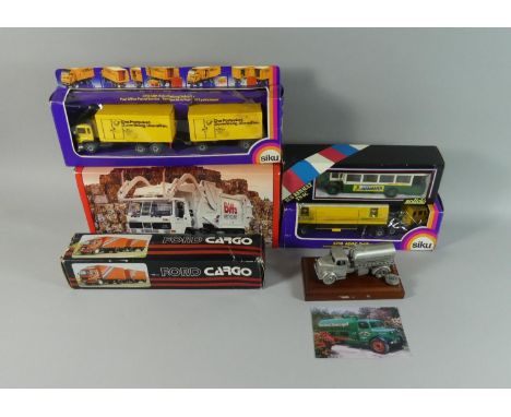 A Collection of Six Boxed Vehicles by Various Makers to include Two Siku Germany Post Office and ADAC MOT Truck, Solido Renau