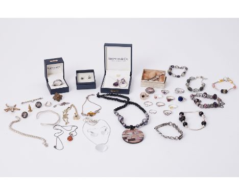 An interesting mixed lot to include silver rings set with paste stones and some gemstones, pendants, bracelet, brooch, earrin