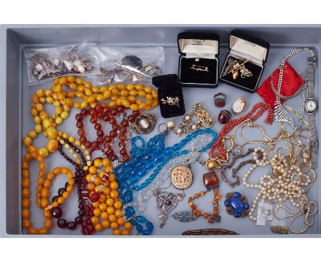 An interesting large selection of costume jewellery &amp; some silver items including beads, faux pearls, brooches, earrings,