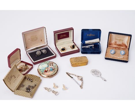 A mixed lot including a silver miniature hand mirror, Rotary wristwatch, New York Bremen Captains Suite tin, numerous cufflin