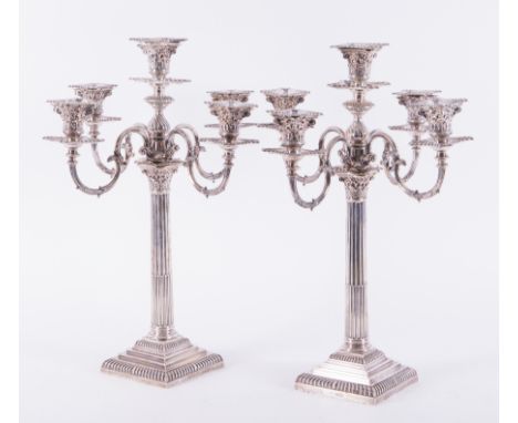 A matched pair of late Victorian silver Corinthian column four branch, five light candelabra, one dates Sheffield 1893, the o