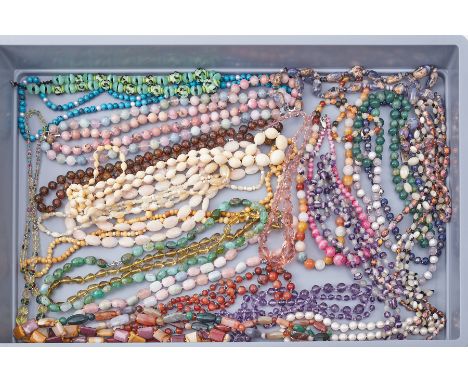 A large mixed lot of mainly semi-precious beads to include monazite, green quartz, pink opals, chrysoprase, lapis, pearls, ja