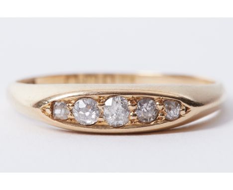 An 18ct yellow gold five stone ring set with old round cut diamonds, approx. 0.14 carats, 2.45g, size N 1/2.