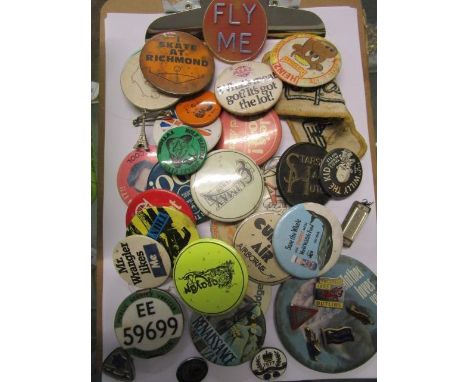 A small collection of enamel and cloth badges to include Butlins, Pontins and various 1980s and earlier badges, along with a 