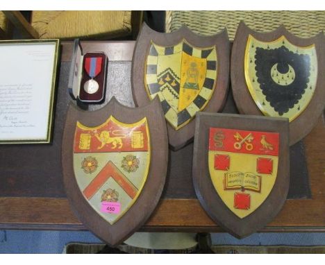 A mixed lot to include a coat of arms plaques and an imperial service medal and citation 