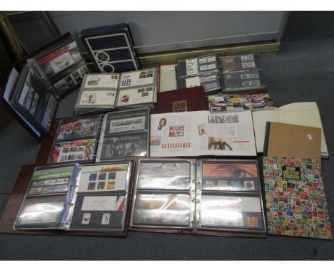 Four Royal Mint collectors stamp albums, two albums of First Day covers, an album of special stamps and three stamp albums, a