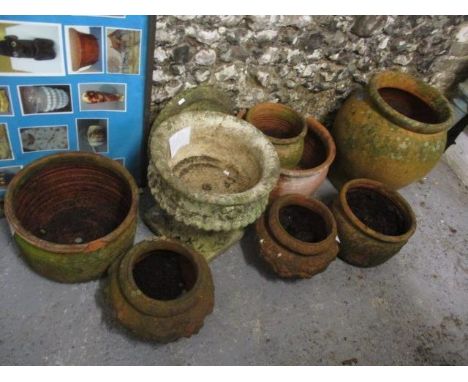 Mixed terracotta planters, together with a composition planter on stand and a tray 