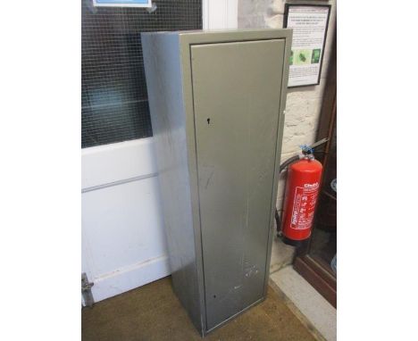 A Braxton gun cabinet 52 1/2"h x 16"w x 12 1/2"d with two sets of keys 