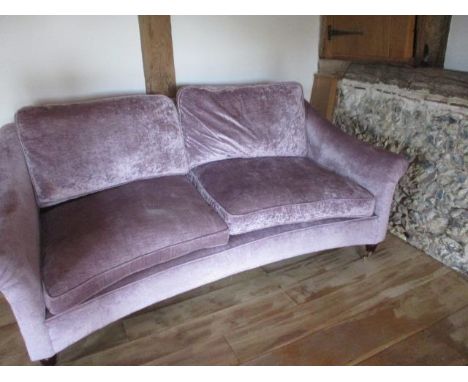 A Laura Ashley Reigate, two seater sofa with slight concave design to the seats, in a Villandry Amethyst fabric, with stained