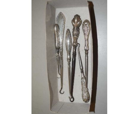 Quantity of white metal handled button hooks