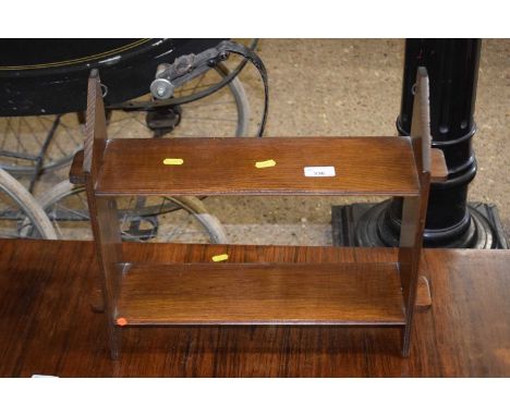 A small oak wall shelf