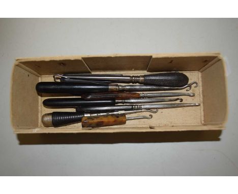 Quantity of assorted button hooks