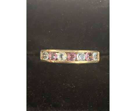 9ct gold ring set with 4 aquamarine and 3 amethyst Size M 1.8 grams