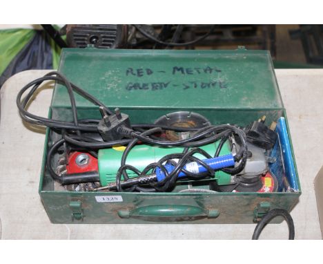 A green metal toolbox and contents of tools to include a Hitachi G12S1 240v angle grinder and a soldering iron