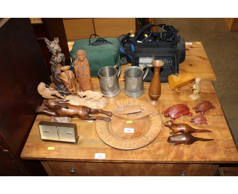 A German bread plate, carved wooden ornaments AF, mantel clock, a wooden trunk, two pewter tankards