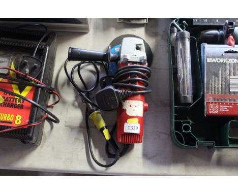 A Power Devil 580w angle grinder and a soldering iron