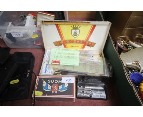 A collection of smoking related items, a cased vintage razor etc.