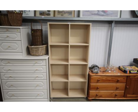 A laminate open fronted shelf unit