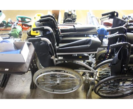 A folding self propelled wheel chair AF and a folding wheelchair AF