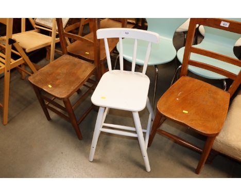 A white painted stick back child's chair 