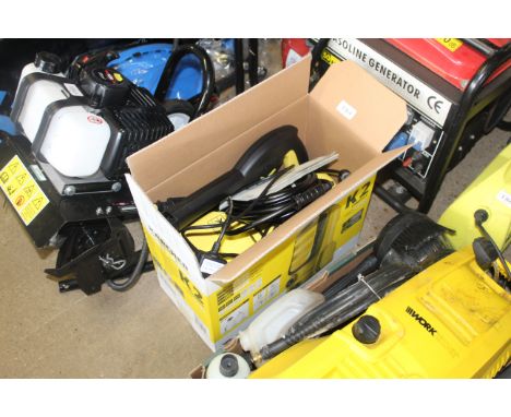 A Karcher K2 compact pressure washer with instruction guide and original box 