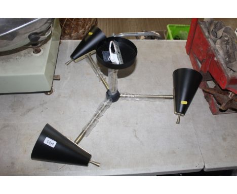 A three branch ceiling light fitting, unused