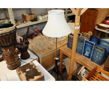 A retro style standard lamp and white shade 