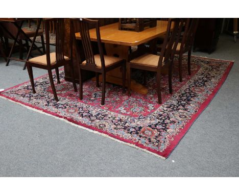 Khorasan Carpet, the pale aubergine field of vines centred by a medallion framed by floral borders, 305cm by 247cm