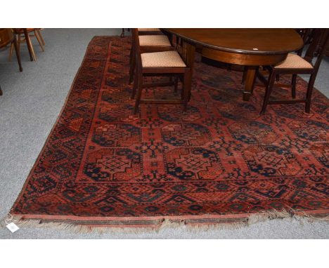 Ersari Carpet, the field with columns of elephant foot guls enclosed by borders of serrated motifs, 430cm by 206cm