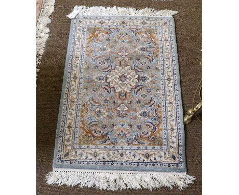 Indian Carpet, salmon pink field of leafy vines around a central medallion, framed by jade borders 313cm x245cm together with