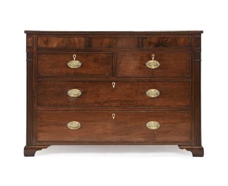 A George III Mahogany and Pine-Lined Straight Front Chest of Drawers, the later top above three moulded panels with two short