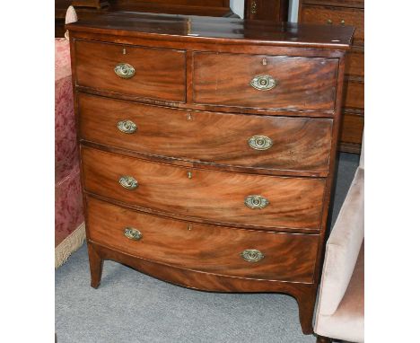 A Late Georgian Mahogany Bowfront Chest, with two short over three long drawers with cock beading and raised on bracket feet,