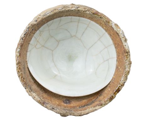 A Fine Chinese Song Dynasty Qingbai Porcelain Dish in Kiln Saggar. Excavated from a kiln site in the Jingdezhen area of Jiang