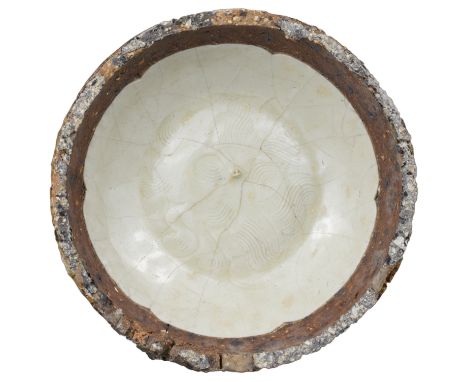 A Fine Chinese Song Dynasty Qingbai Porcelain Dish in Kiln Saggar. Excavated from a kiln site in the Jingdezhen area of Jiang